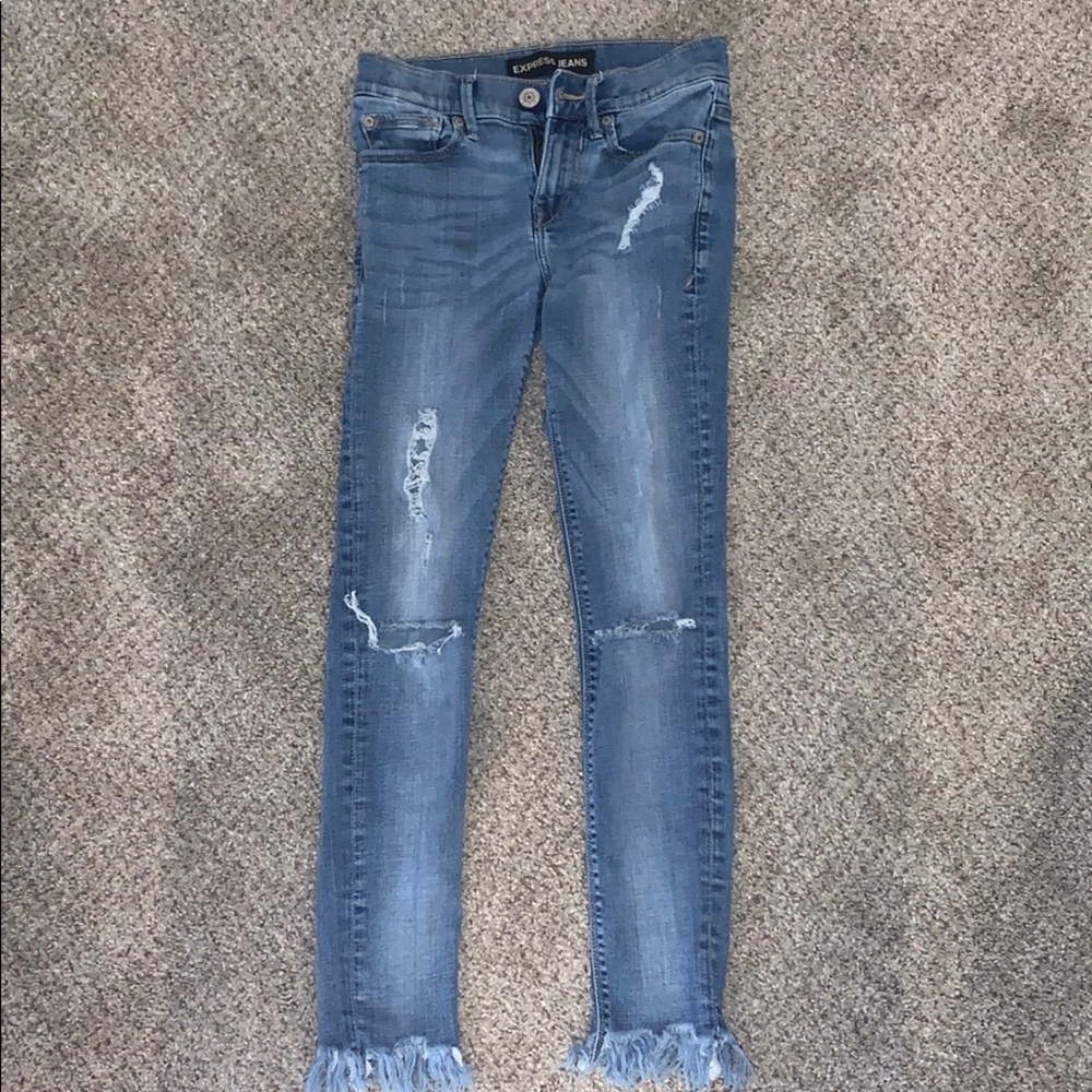 Frayed denim express jeans